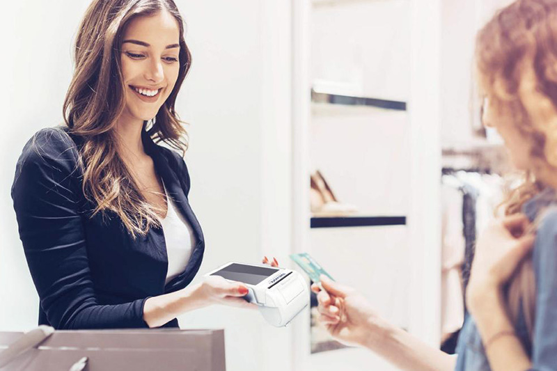 cashier-woman-receives-card-payment